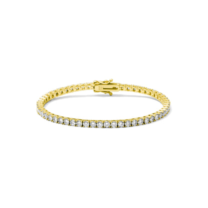 Gold bracelet with moissanite diamonds on a white background