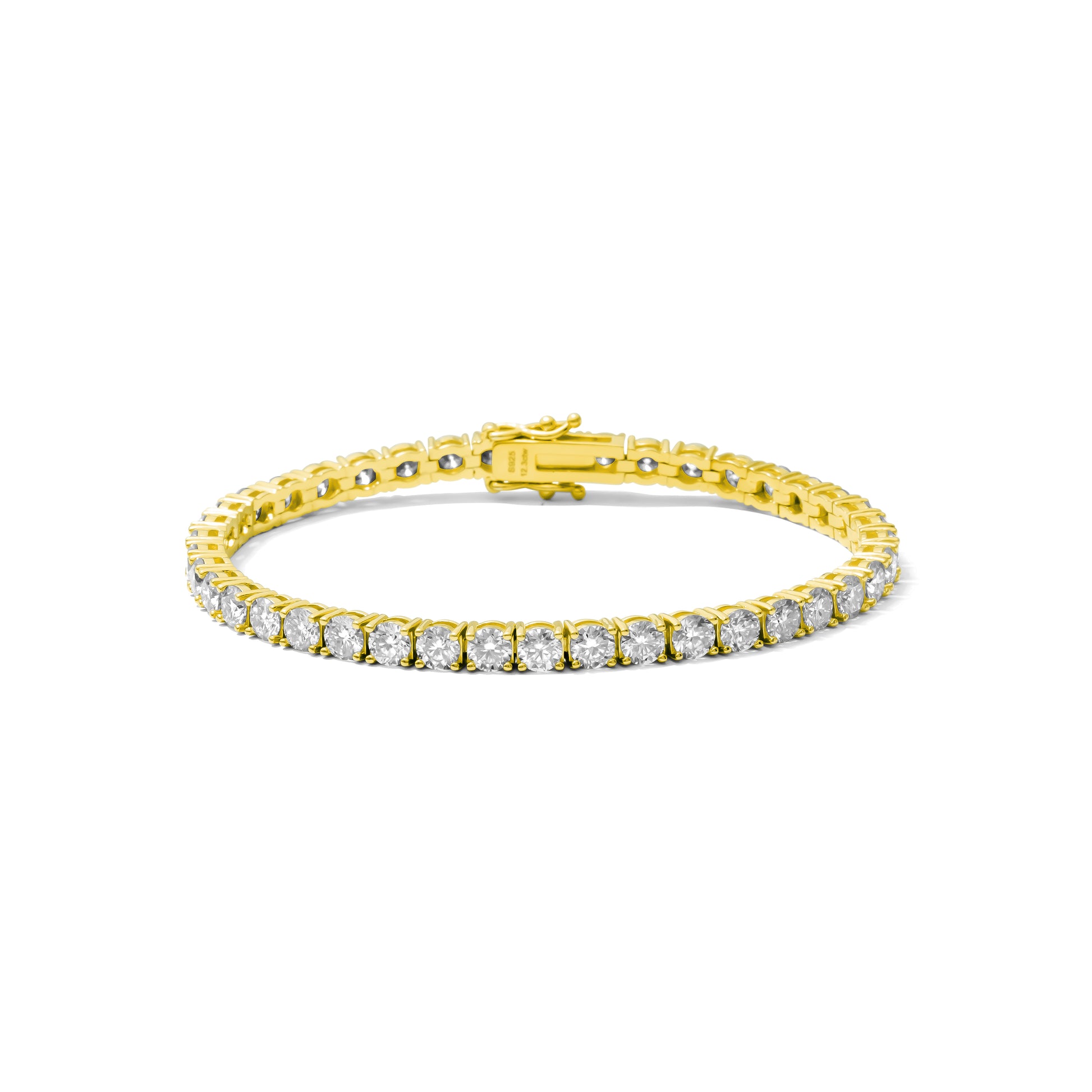 Gold bracelet with moissanite diamonds on a white background