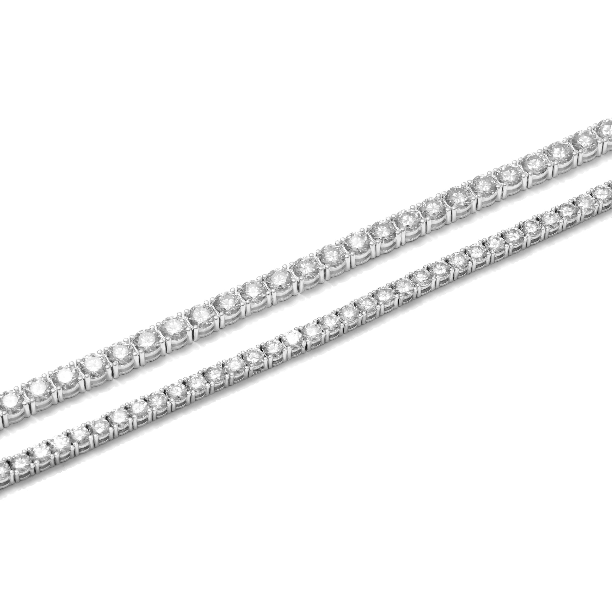 Diamond tennis bracelet on a white background showing 3mm vs 4mm stone size comparison